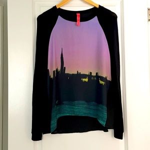 2/$25 eight sixty cool screen silk blouse with soft jersey arms.  Size small.